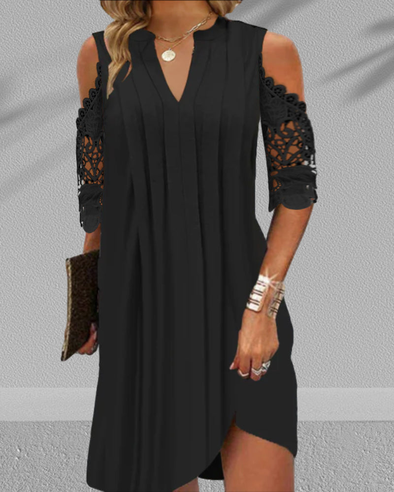 Abendkleid mit Spitzendetails an den Ärmeln